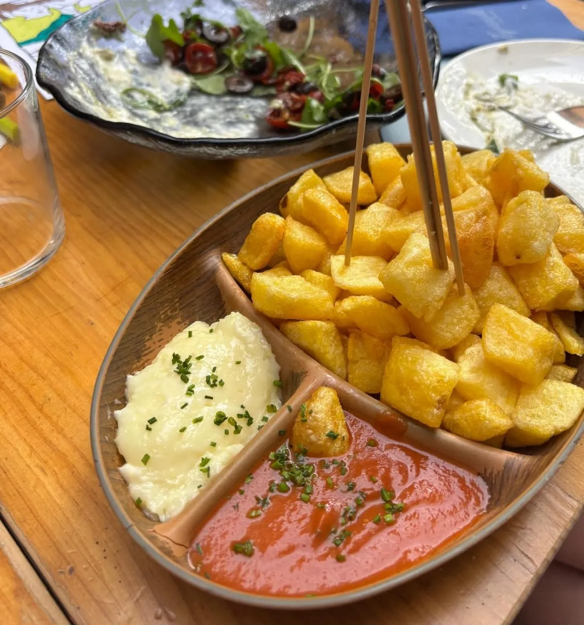 Patatas bravas with aioli and tomato sauce
